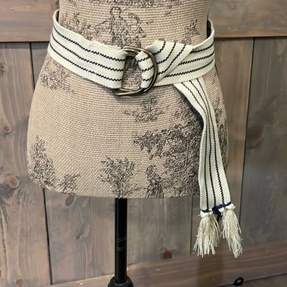 Natural fiber handcrafted loom woven tan and navy belt fits up to 38 inches